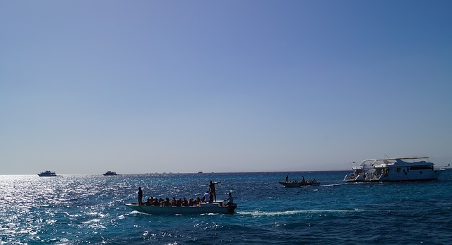 View of boats with scuba divers at the Red Sea